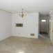 view from living room to dining area with pass through from kitchen
