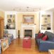 family room with gas logs, built-in shelvesfrench doors to screened porch